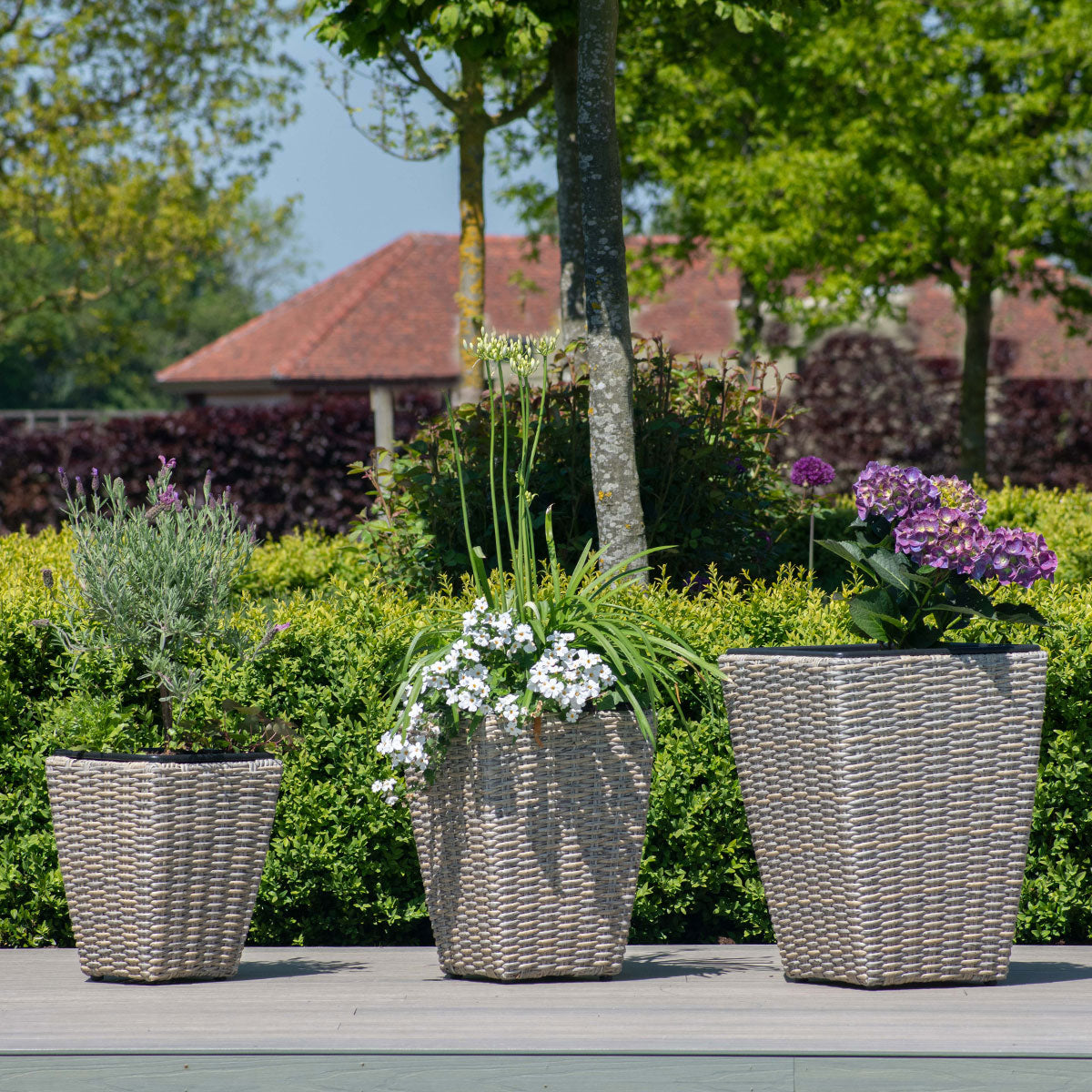 kendal outdoor rattan 3x planter set with plastic inners