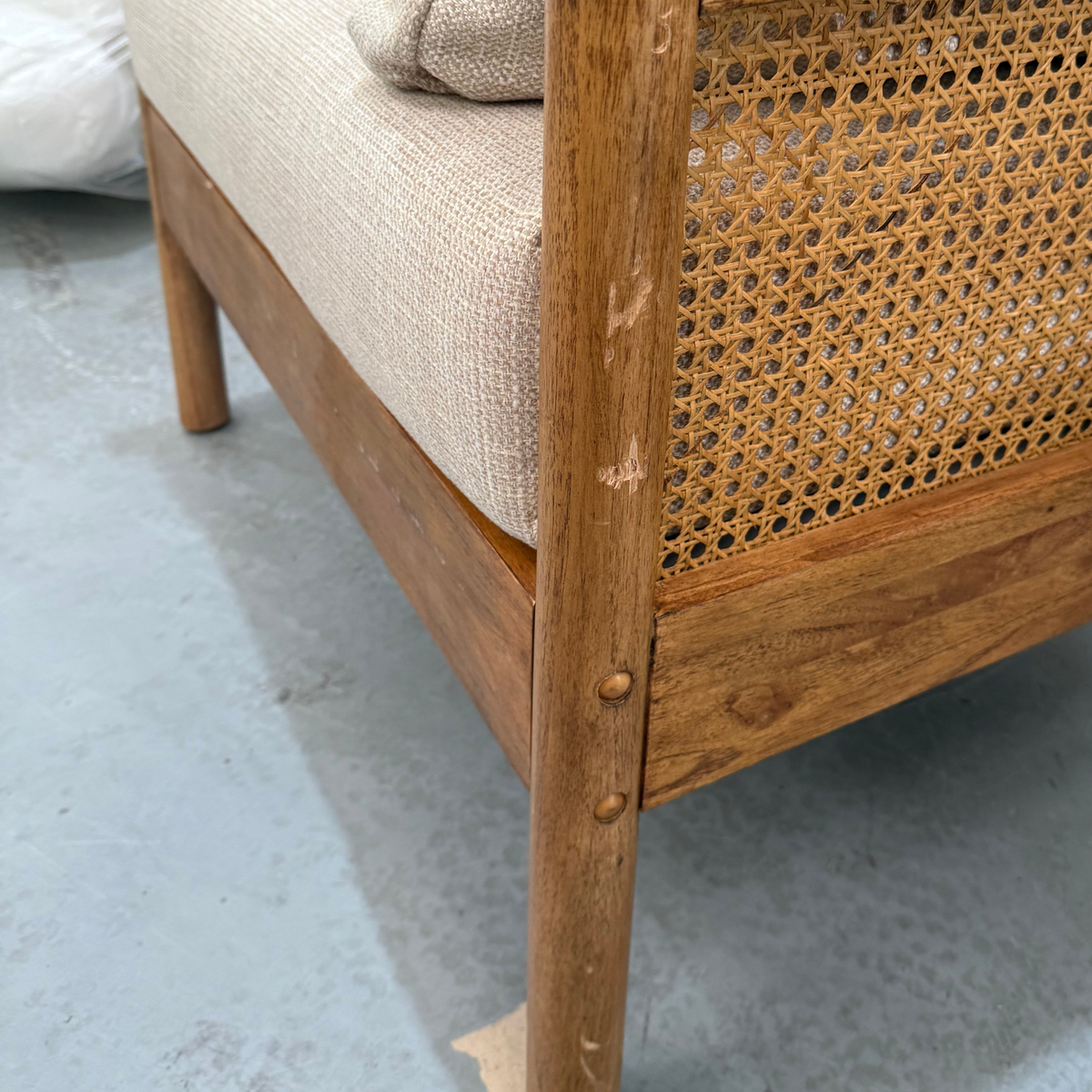 Mindi Light Oak Cane Armchair in Biscuit - Factory Fault