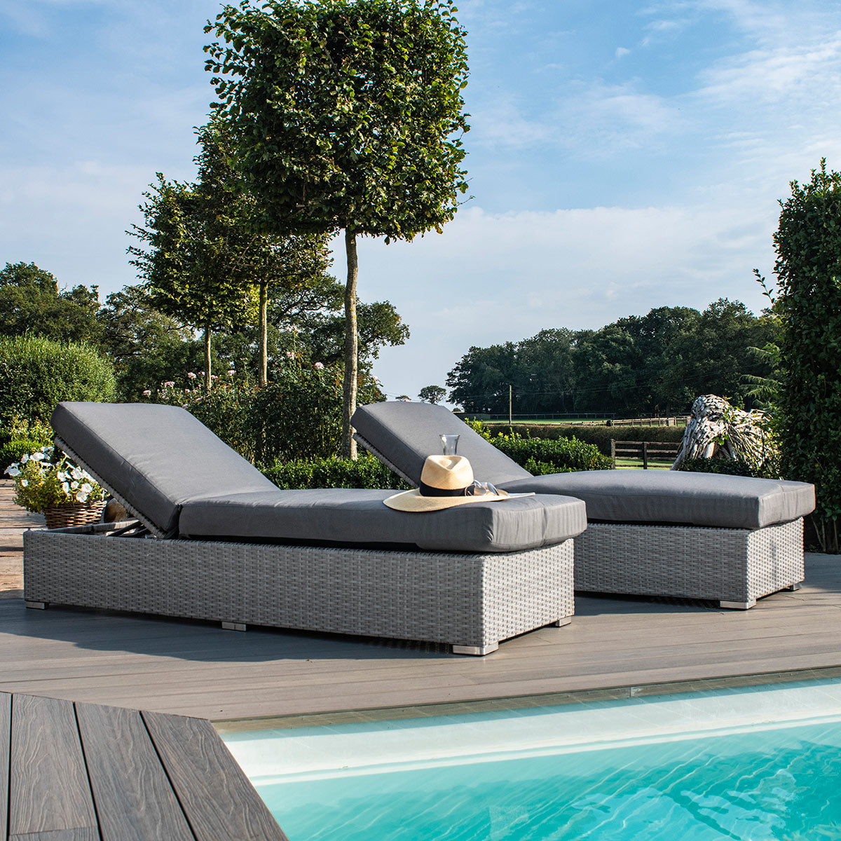 cartmel outdoor rattan sunlounger and side table set