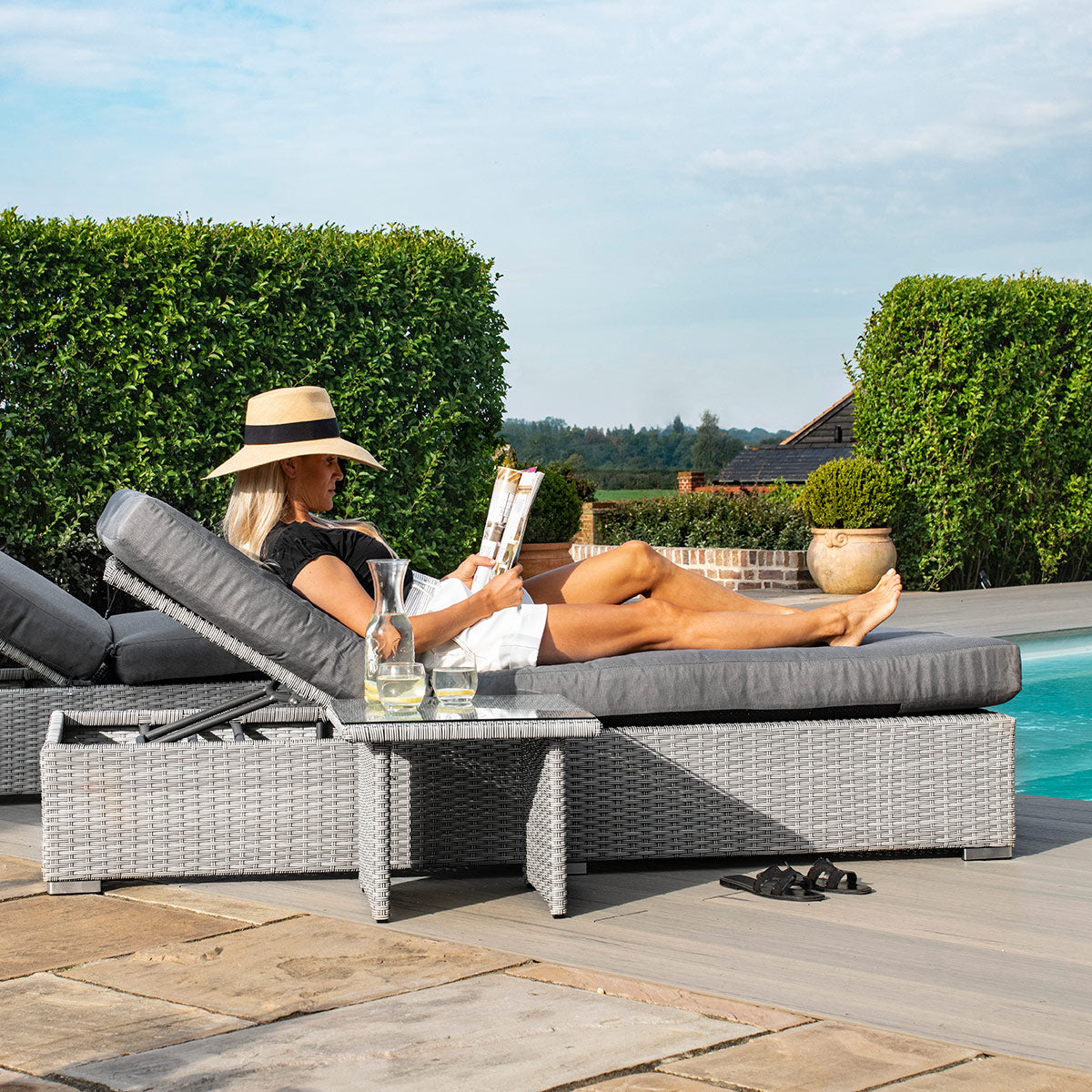 cartmel outdoor rattan sunlounger and side table set