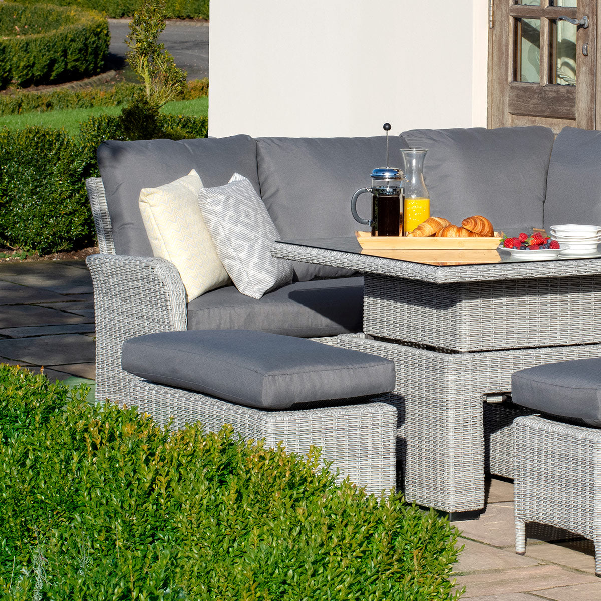 cartmel outdoor rattan corner sofa set with rectangular adjustable table