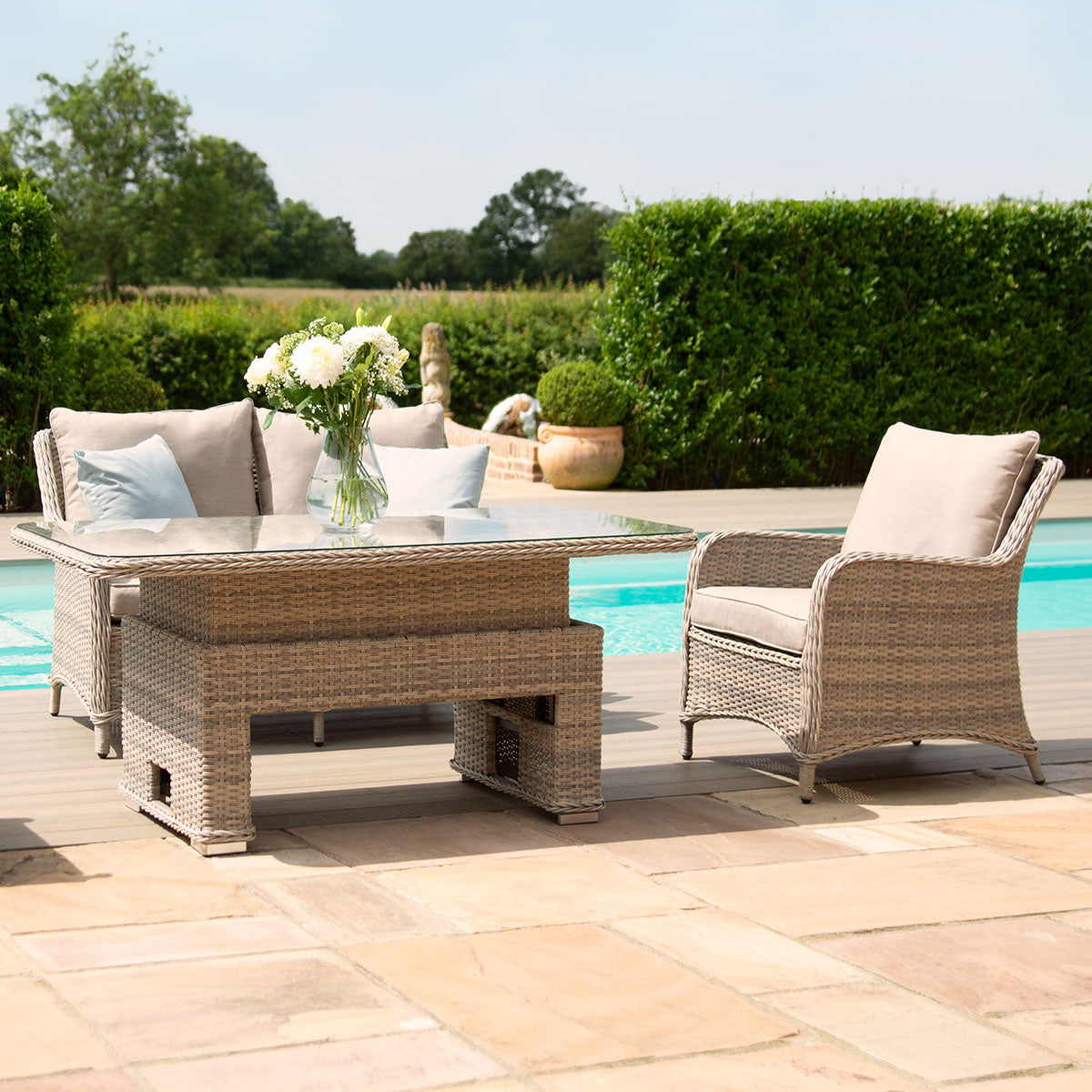 kendal outdoor rattan 2 seat suite with 2x footstools & adjustable table