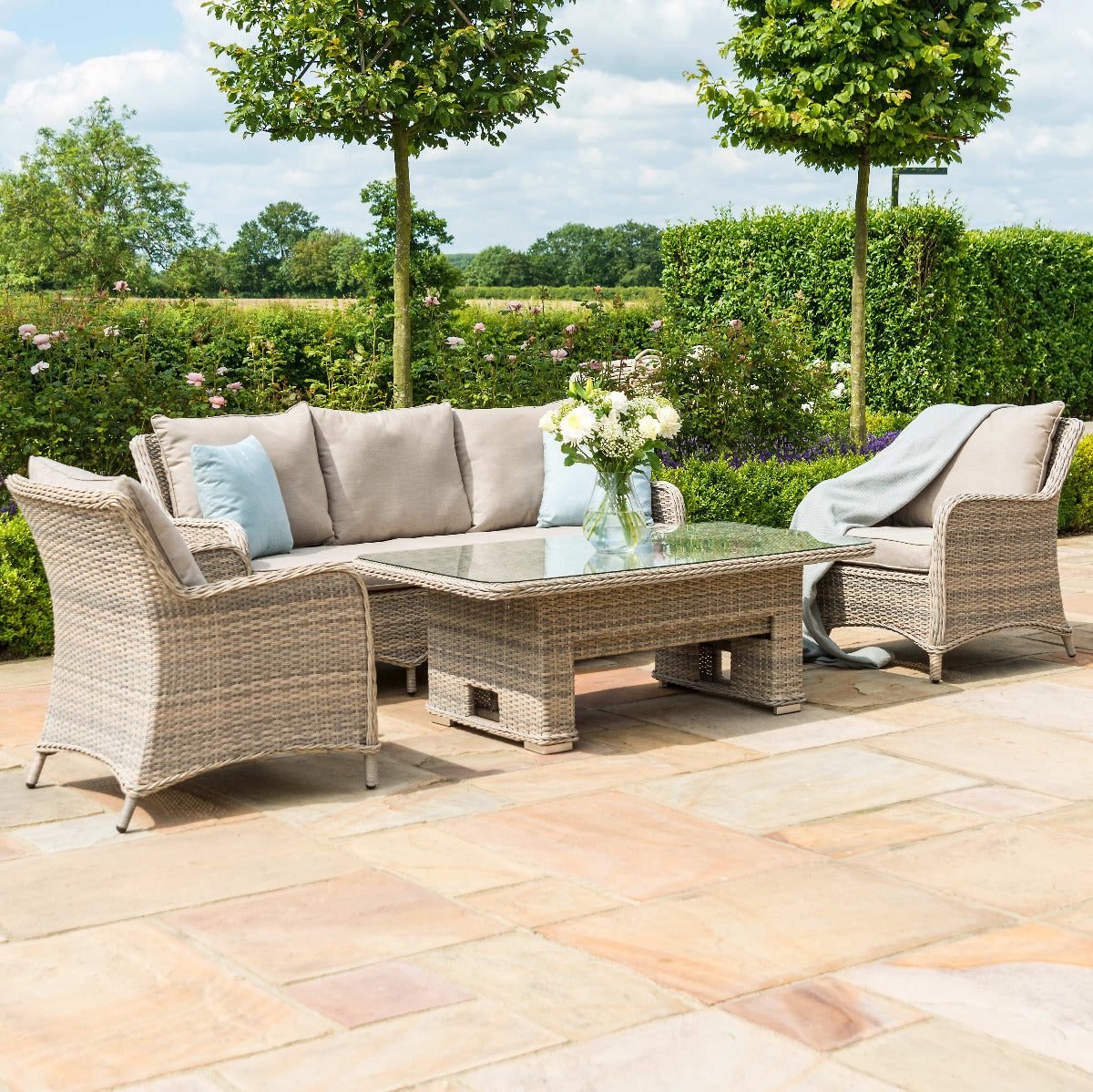 kendal outdoor rattan 3 seat suite with 2x footstools & adjustable table