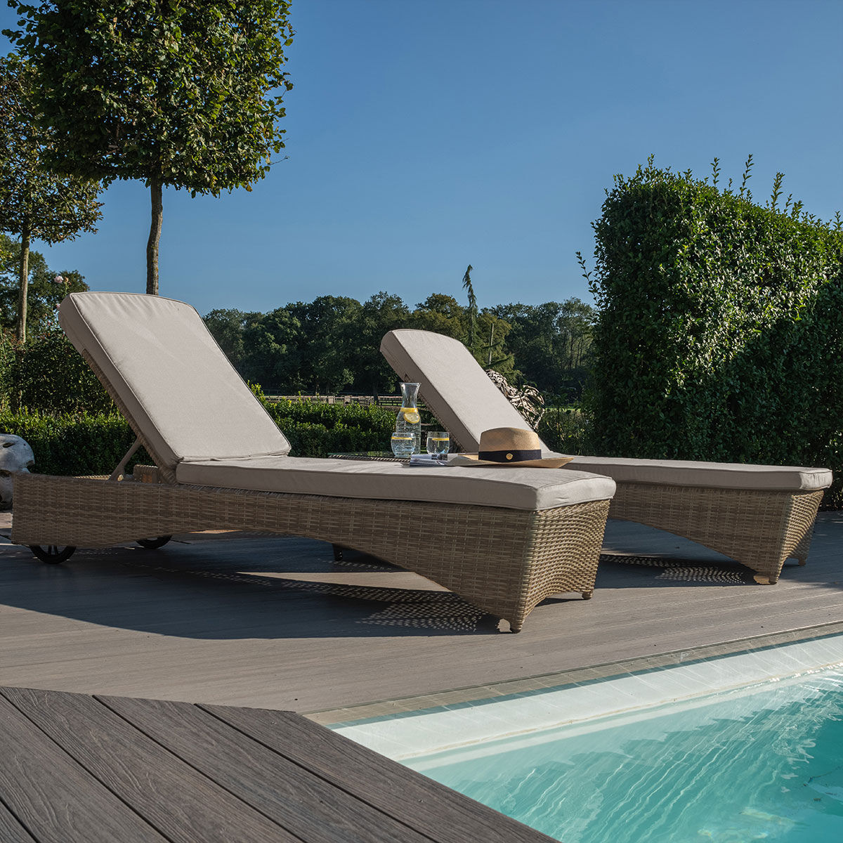 Grasmere Outdoor Rattan Sunlounger and Side Table Set