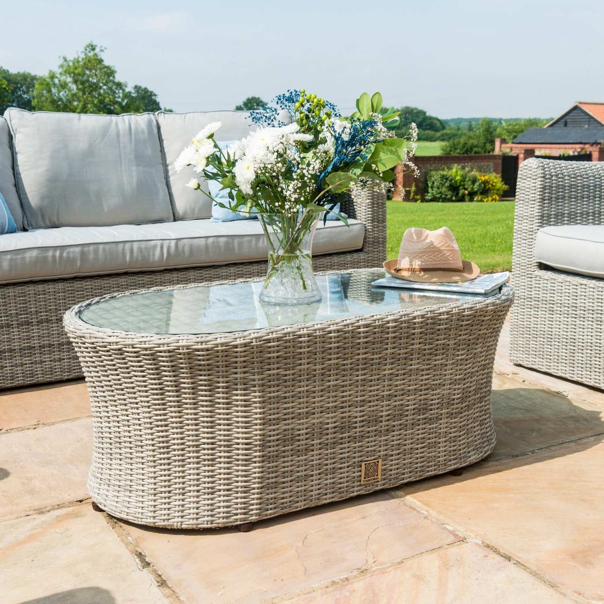 grasmere outdoor rattan 3 seater suite with oval coffee table