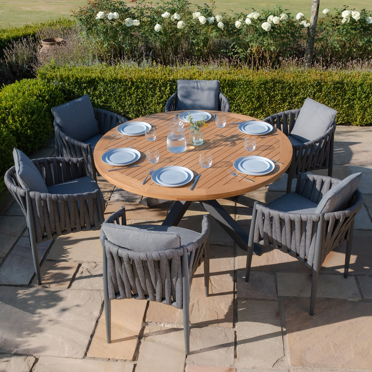 Suru Teak Round Dining Table With Milan Dining Chairs - Charcoal