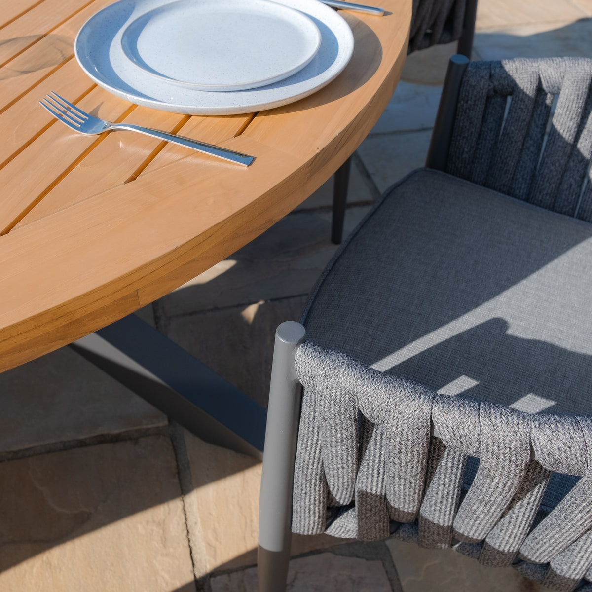 Suru Teak Round Dining Table With Milan Dining Chairs - Charcoal